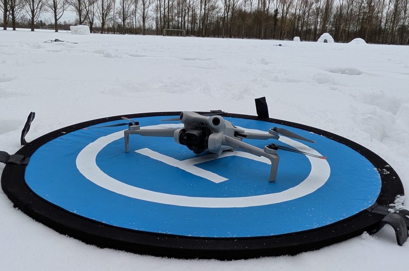 A DJI Mini 4 Pro drone used in the real-world validation