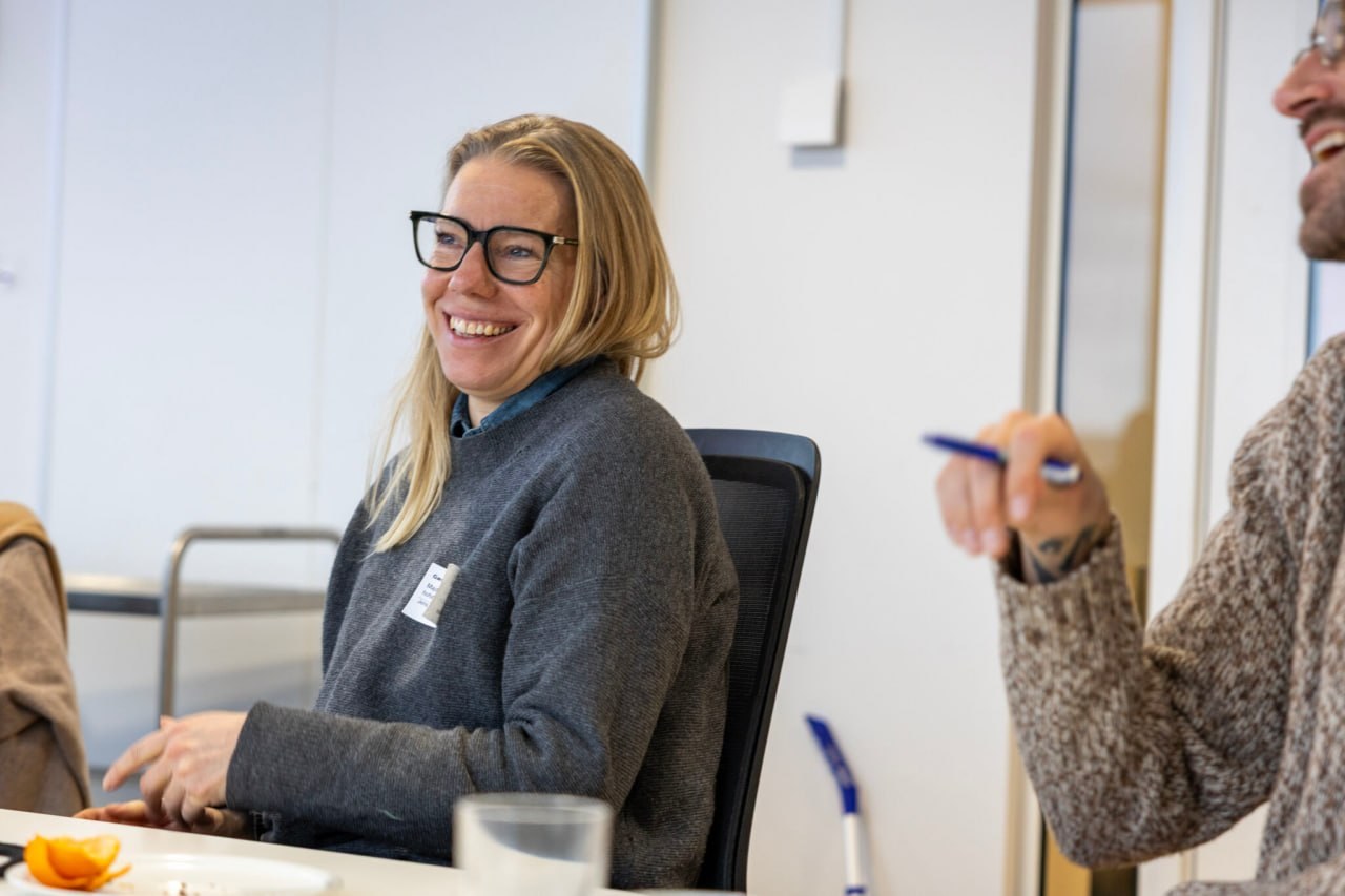 Project partner smiling at the Amagerværket workshop